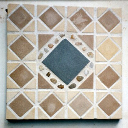 Mosaic with tile and beach stones