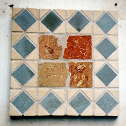 Mosaic with tile and sliced rock
