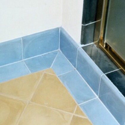 Light blue bullnose 6" X 8" tile, 8" yellow floor tile, dark blue 8" wall tile