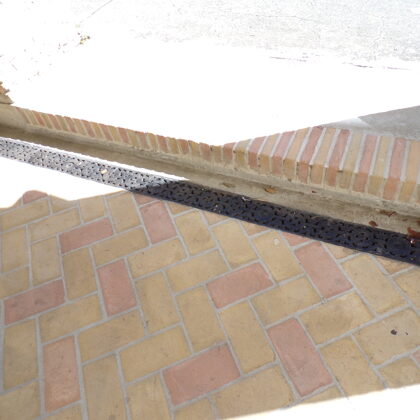 King Street sidewalk with drain detail