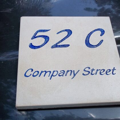 Carved street address plaque in Christiansted