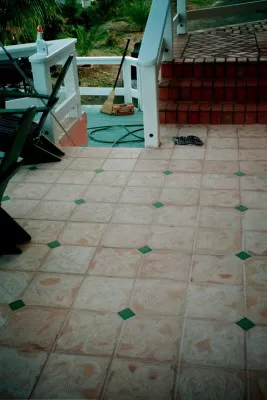 Light terra cotta 12" travertine with 3" green details