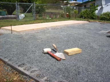 20" X 2" tile dry laid on bed of sand and cement