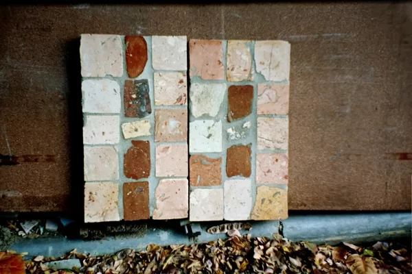 Inlaid with pieces of brick and stone