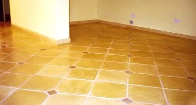 12" yellow floor tile with 3" brown detail