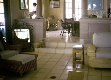 12"  floor tile with stairs and bulnose edges looking into kitchen