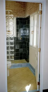 Dark blue 8" wall tile, yellow 8" floor tile, light blue billnose