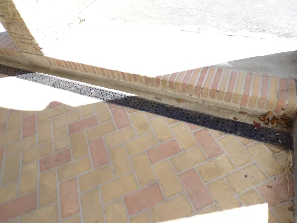 King Street sidewalk with drain detail