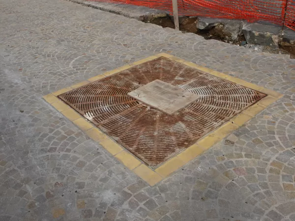 Vehicular brick in street