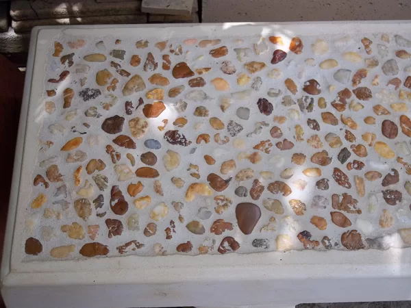 Detail of pebble top bench