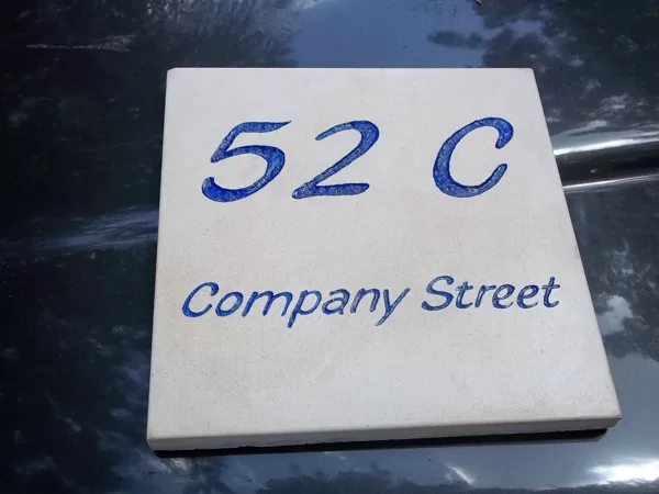 Carved street address plaque in Christiansted